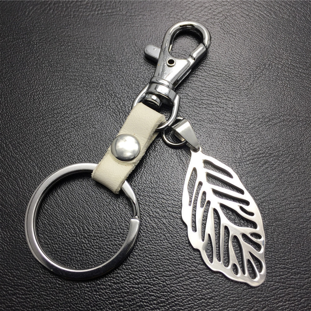 Hollow out leaves titanium steel jewelry accessories cowhide key chain 316 stainless steel men's waist hanging women's bag pendant
