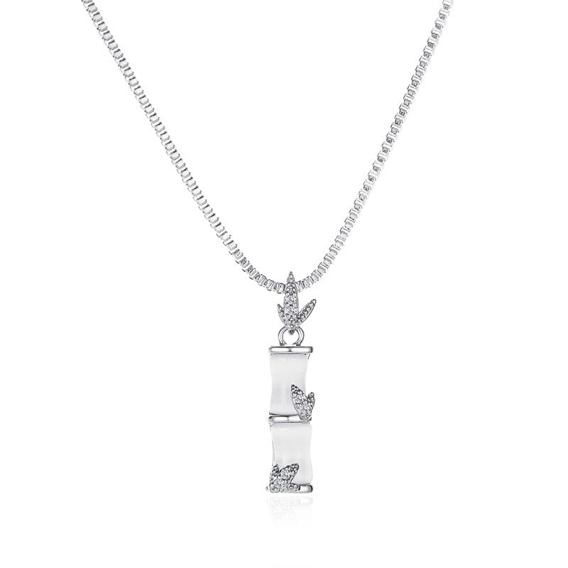 Temperament cat's eye carnation necklace female niche design exquisite bamboo pendant clavicle chain creative stall accessories