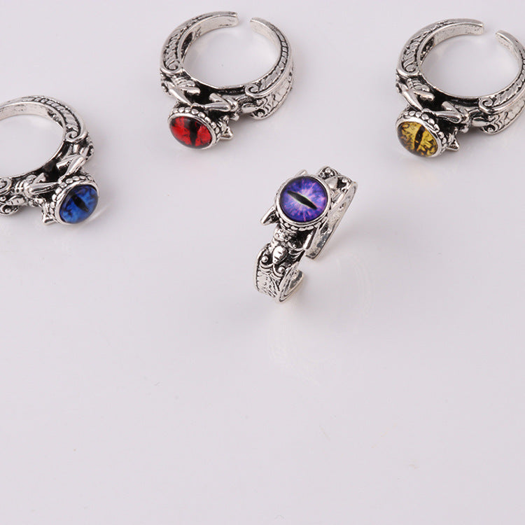 Fashion ring personality male and female models inlaid skull three-dimensional multi-color magic eye personality ring