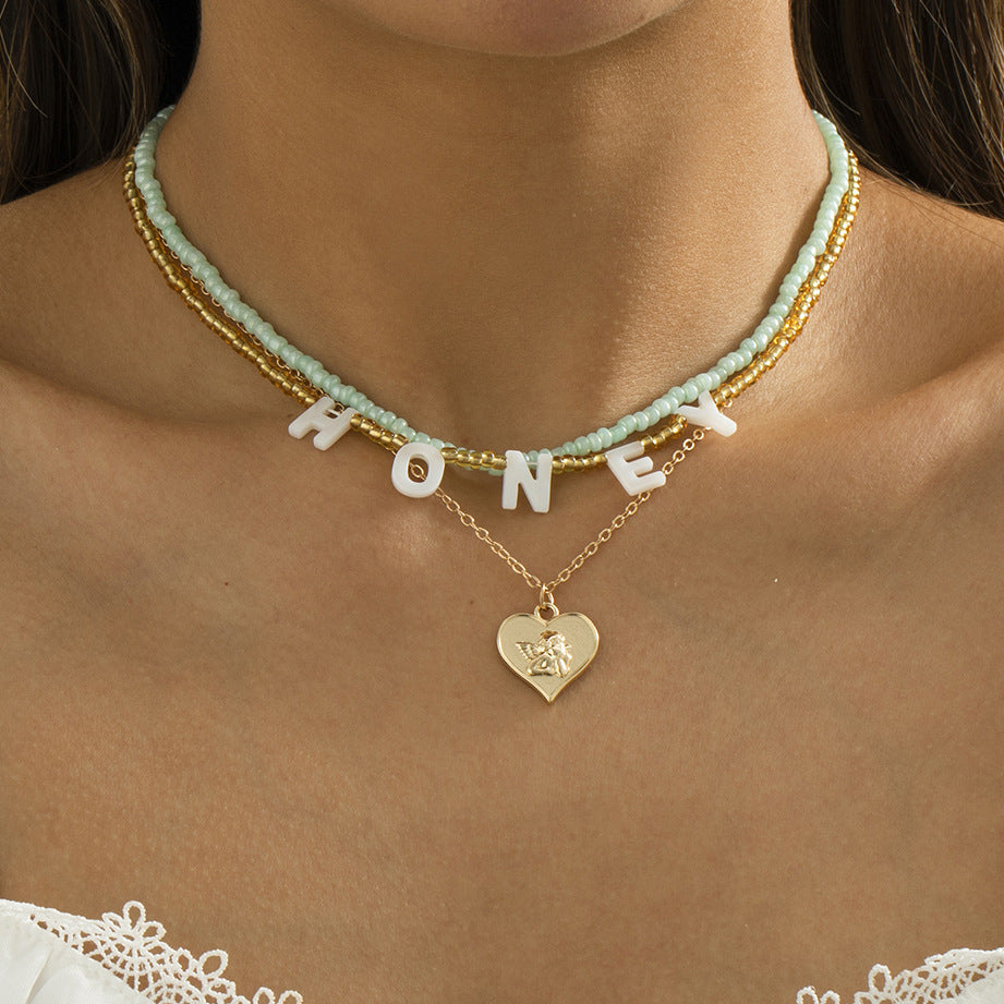 Retro Simple Rice Bead Letter Stacked Necklace Metal Heart Shaped Angel Portrait Clavicle Necklace Female