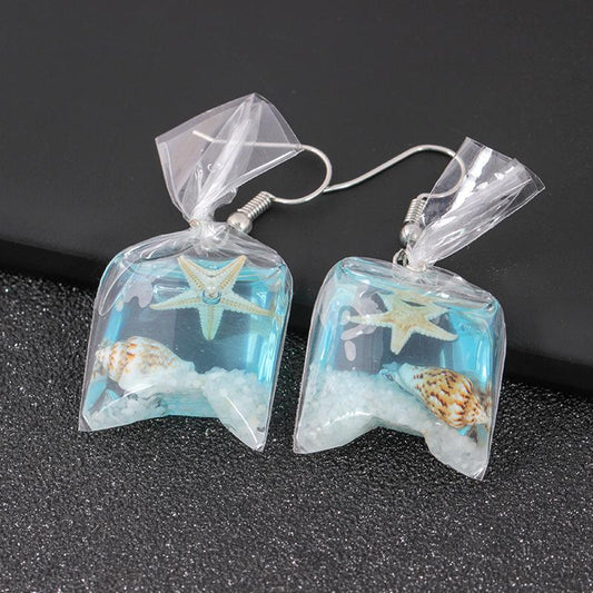 Creative transparent candy ocean conch earrings female personality resin dried flower plant earrings jewelry