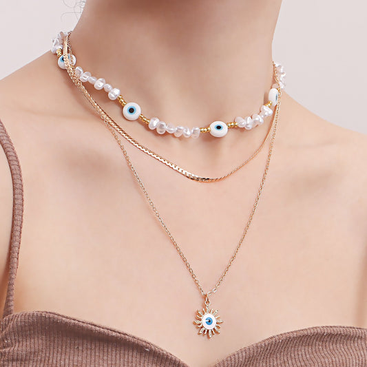 Jewelry ins multi-layer devil's eye beaded necklace female niche design imitation pearl clavicle chain