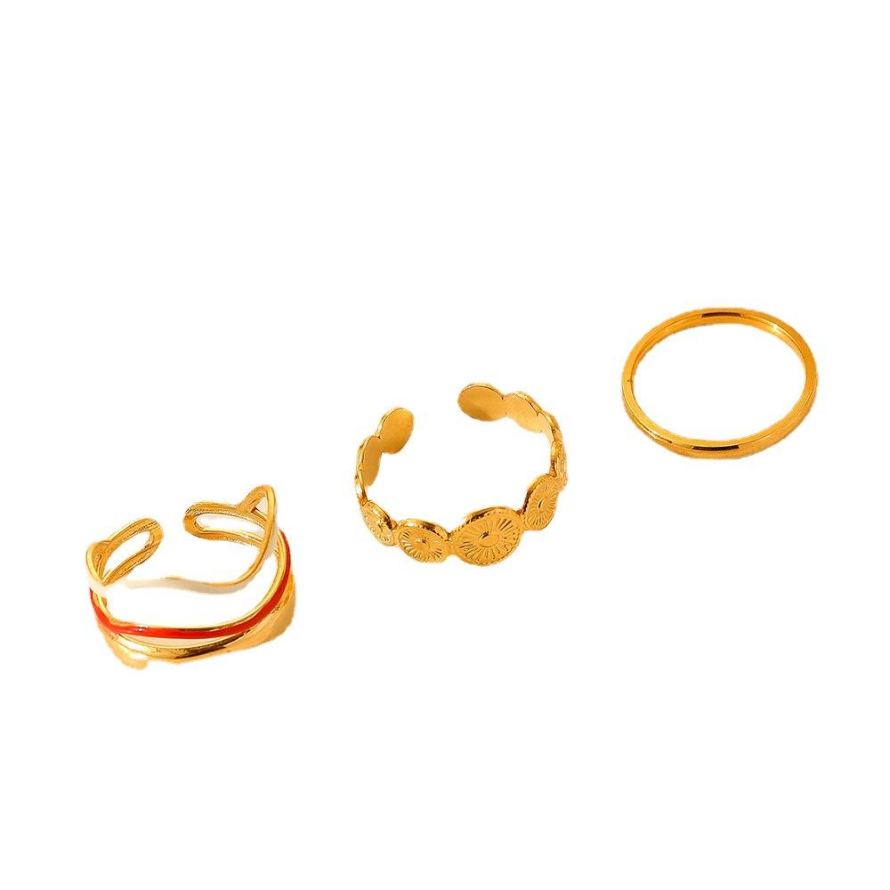 Sweet and fresh niche high-end fashion design ladies stainless steel gold coin water wave drop oil ring set