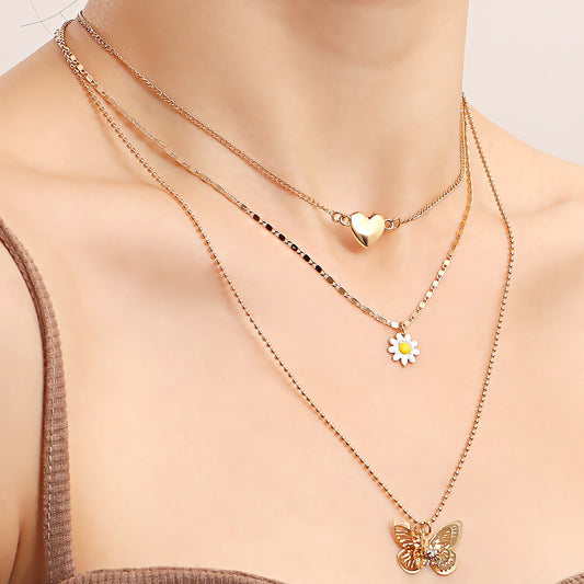 Jewelry trend multi-layer love hollow butterfly necklace female ins niche design sense light luxury