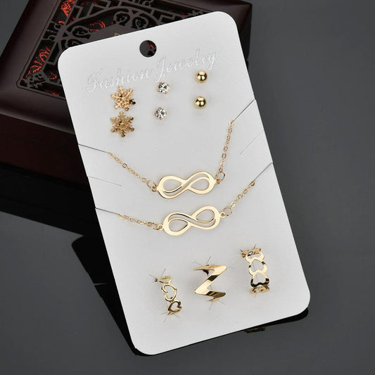Punk Gold Plated Infinity Necklace Snowflake Stud Earrings Ring Bracelet Set Ornament