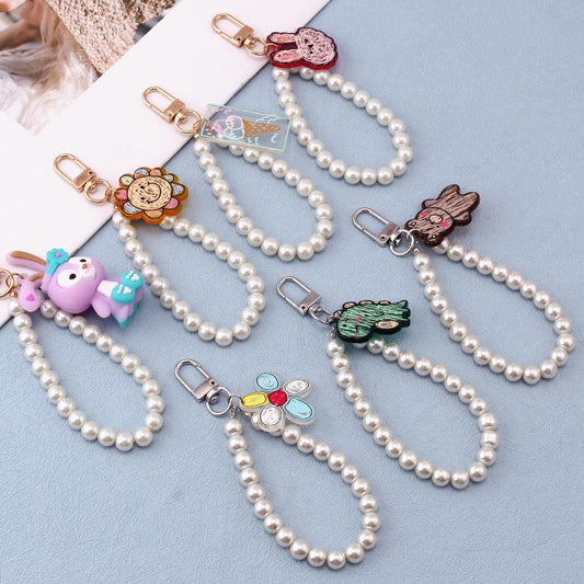 Xingdelu key chain cute creative soft pottery cartoon doll doll acrylic dinosaur rabbit bag pendant