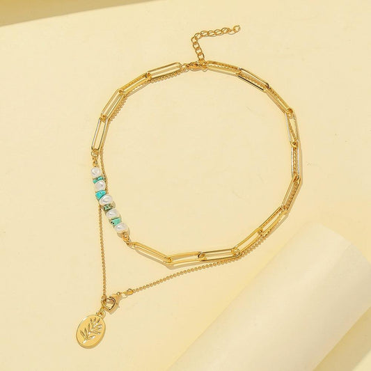 Fashion personality ins double-layer pearl crushed stone turquoise leaf pendant necklace clavicle chain female