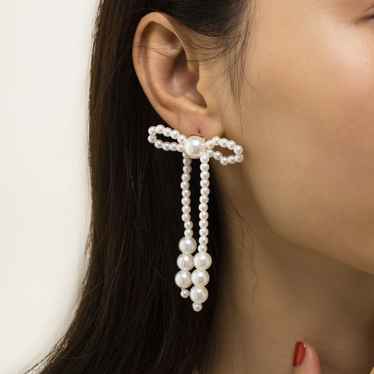 Jewelry simple and versatile pearl bow earrings temperament small fresh beaded tassel earrings for women