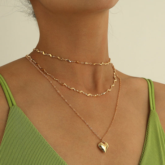 Jewelry fashion glossy three-dimensional love pendant necklace women's multi-layer S-shaped chain peach heart necklace