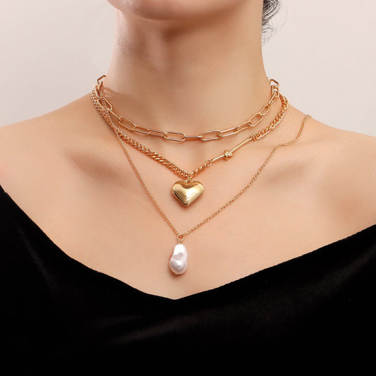 Explosive ins metal special-shaped pearl necklace simple and versatile big peach heart pendant necklace female
