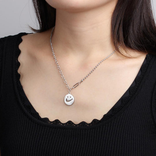 Playful smiling face titanium steel round plate pendant ins hip hop stainless steel bead chain cute expression sweater chain