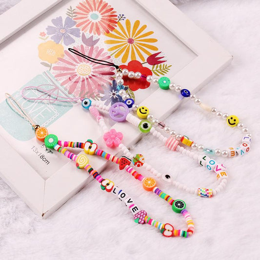 Fashionable soft pottery color mix and match fruit smiley face beaded letters anti-drop mobile phone chain