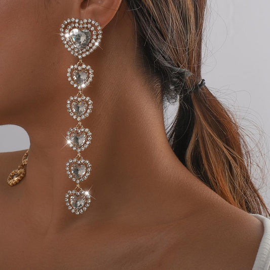 E1347 Exaggerated Shining Rhinestone Earrings Peach Heart Claw Chain Long Tassel Earrings European Style Cold Stud Earrings