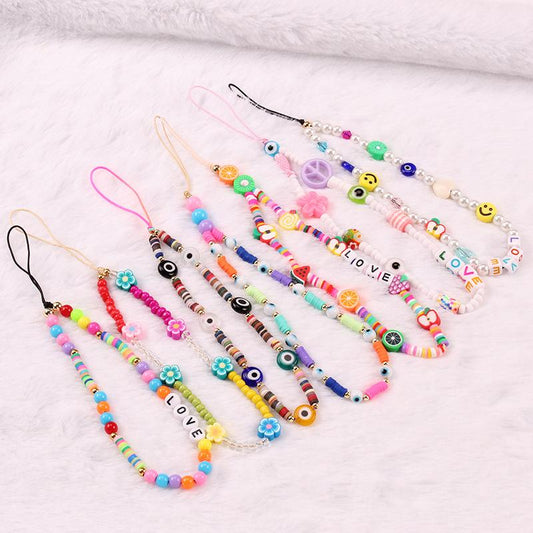 Fashionable soft pottery color mix and match fruit smiley face beaded letters anti-drop mobile phone chain