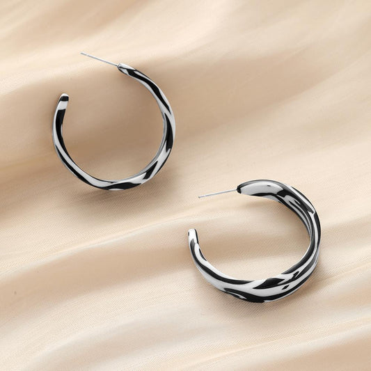 High-end design niche unique fashion resin C-shaped black and white leopard exaggerated earrings personalized female jewelry
