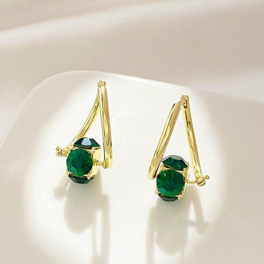 ins emerald zircon earrings French light luxury niche design rotating geometric ear buckle net red earrings trend