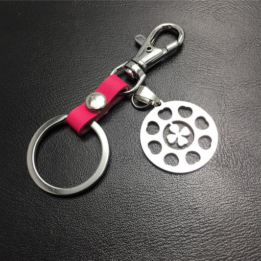 Four-leaf lucky flower titanium steel jewelry stainless steel luggage pendant leather key chain waist hanging couple gift bag listing