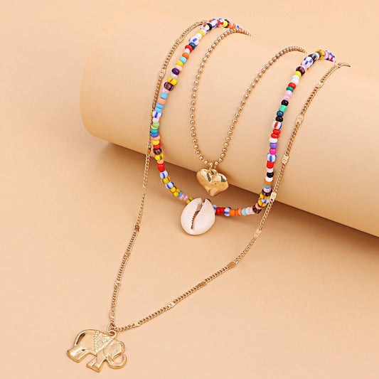 Jewelry fashion women's long multi-layer rice bead chain electroplating metal elephant pendant necklace