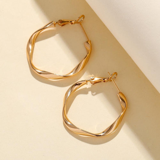 Simple C-shaped cold alloy earrings niche design twist line circle earrings female