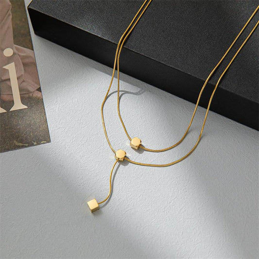 Double-layer small square necklace female small golden ball double-layer hip-hop tassel necklace sweet cool niche light luxury clavicle chain
