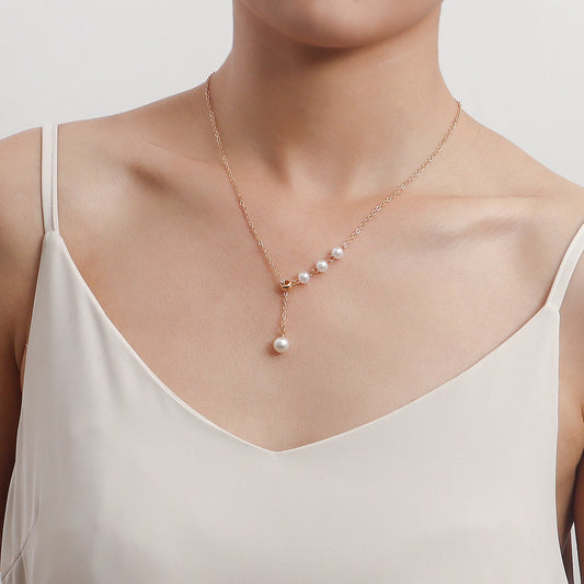 Jewelry simple and versatile imitation pearl pendant clavicle chain necklace female niche design sense light luxury ins