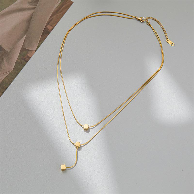 Double-layer small square necklace female small golden ball double-layer hip-hop tassel necklace sweet cool niche light luxury clavicle chain