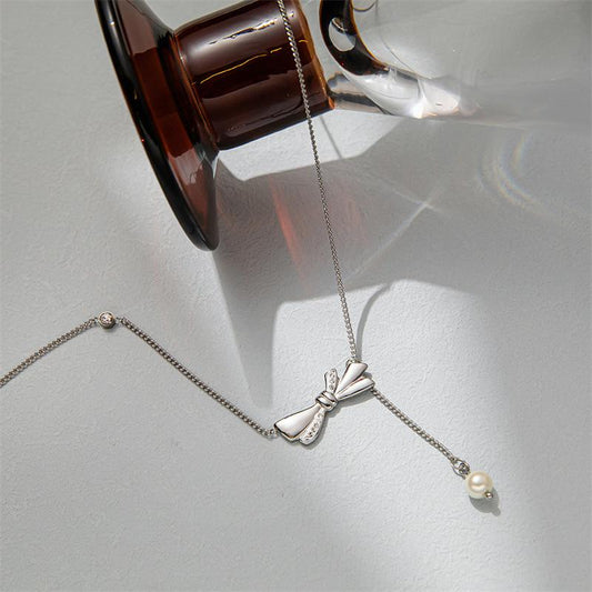 Diamond-encrusted pearl bow tassel necklace female niche design ins sexy clavicle chain simple light luxury net red