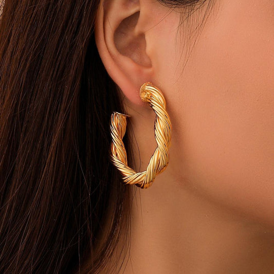Autumn and winter metal simple C-shaped twist earrings golden geometric temperament ladies earrings