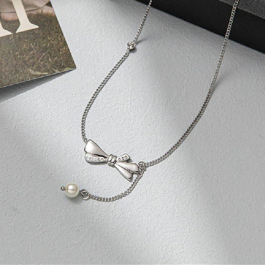 Diamond-encrusted pearl bow tassel necklace female niche design ins sexy clavicle chain simple light luxury net red