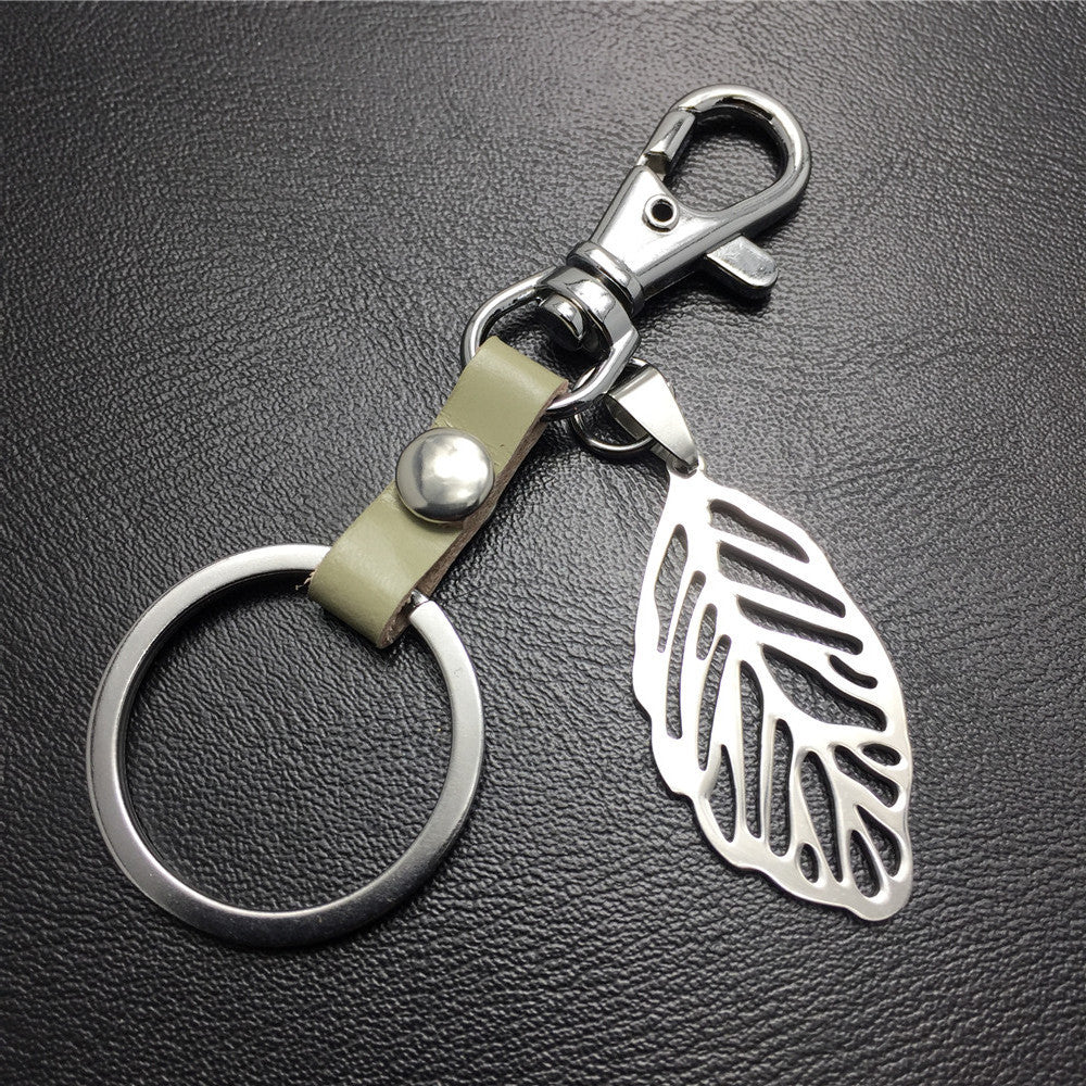 Hollow out leaves titanium steel jewelry accessories cowhide key chain 316 stainless steel men's waist hanging women's bag pendant