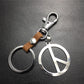 Quan Zhilong GD anti-war logo stainless steel key chain pendant cowhide connection piece Valentine's Day gift world peace