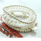 Multi-element Eiffel Tower Pearl Retro Bracelet Coin Six-piece Set Jewelry Multi-layer Elastic Bracelet