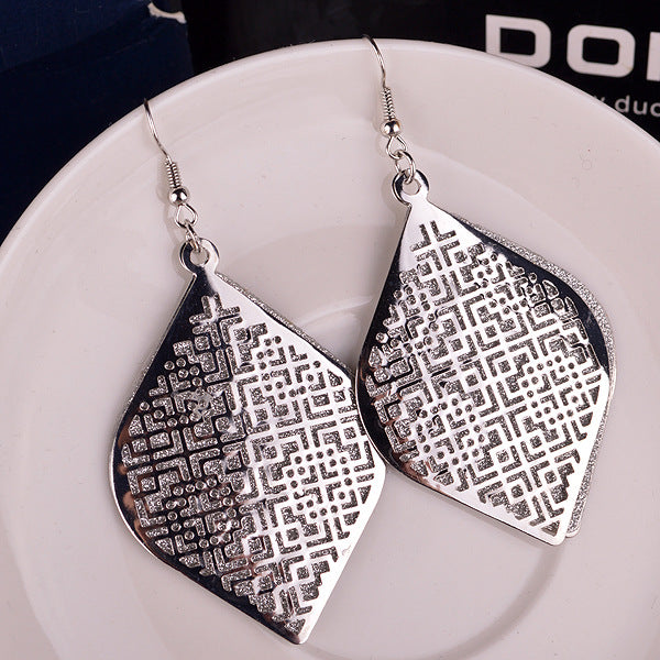 Supply boutique ear jewelry Hollow Chinese earrings multi-layer alloy frosted earrings