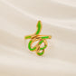 Trendy light luxury niche design green dripping oil snake-shaped stainless steel men's and women's rings