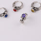Fashion ring personality male and female models inlaid skull three-dimensional multi-color magic eye personality ring