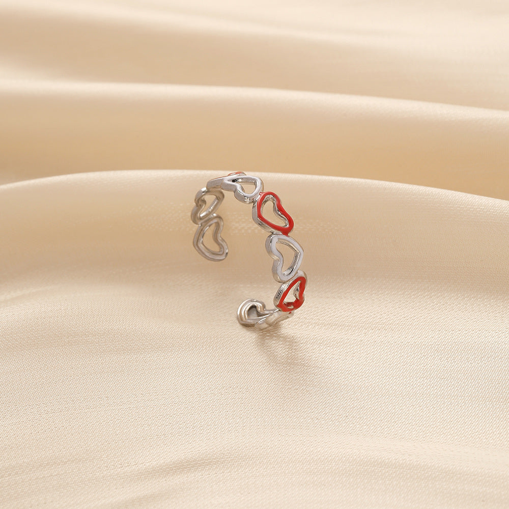 Small and exquisite women's stainless steel creative opening adjustable hollow heart ring