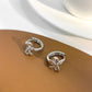 French retro round metal ear buckle ins cold simple bow belt earrings earrings