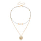 Jewelry fashion double-layer beaded imitation pearl necklace female hollow heart devil's eye pendant necklace