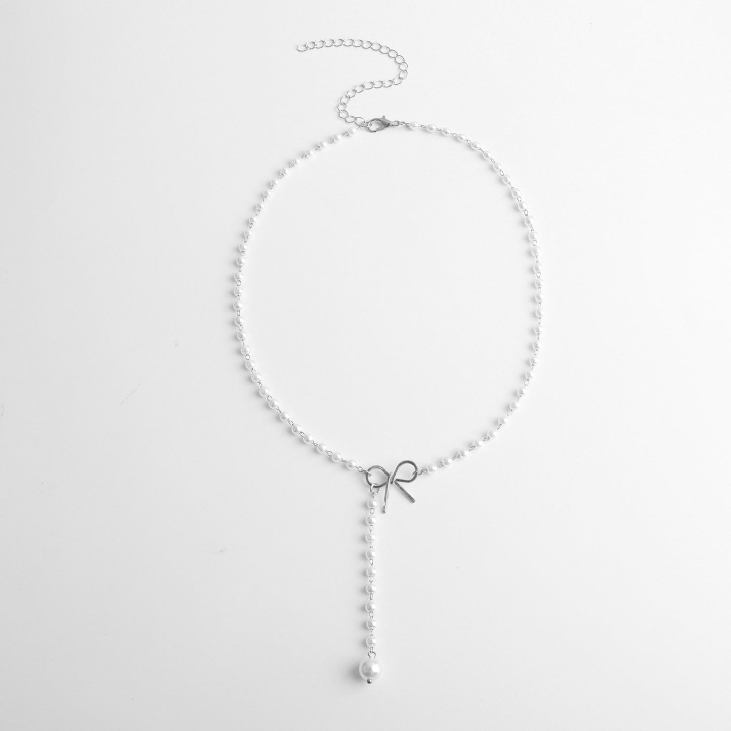 Jewelry Alloy Bow Knot Pearl Tassel Pendant Necklace Ladies Simple Temperament Popular Necklace