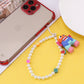 Simple monster rainbow non-slip bag chain cute cinnamon dog soft pottery mobile phone case anti-lost pendant pearl chain
