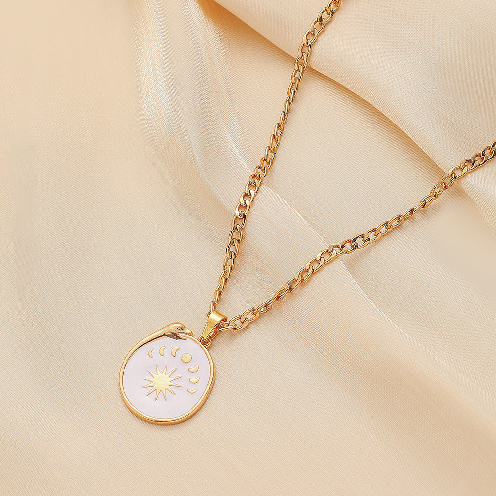 Simple personality light luxury niche metal hollow retro compass coin pendant necklace female