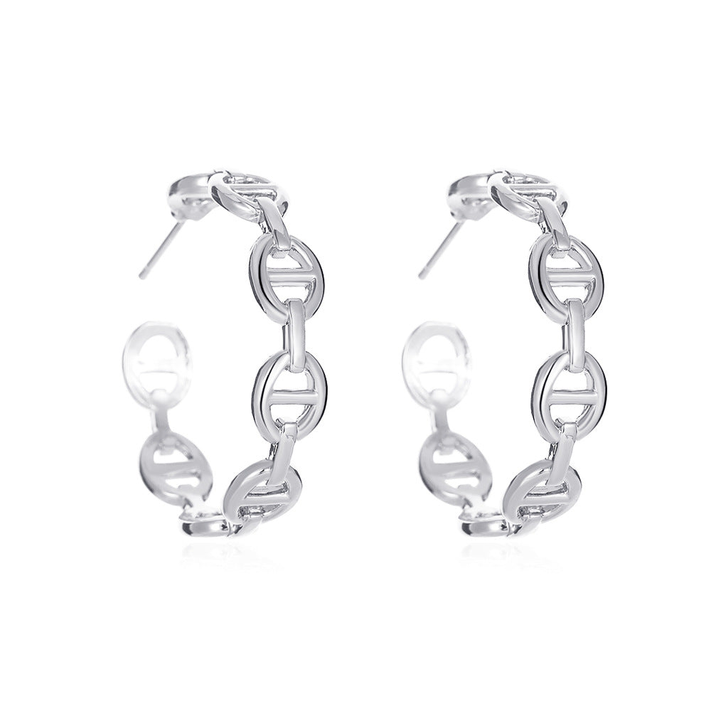 Exaggerated geometric hollow earrings cold C-shaped pig nose earrings net red trend metal earrings accessories