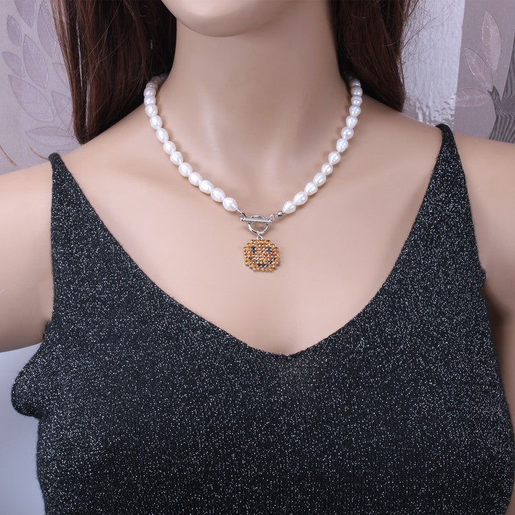 Ins cold smiling face clavicle chain trendy net red pearl chain necklace female personality retro all-match diamond pendant