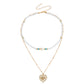 Jewelry fashion double-layer beaded imitation pearl necklace female hollow heart devil's eye pendant necklace