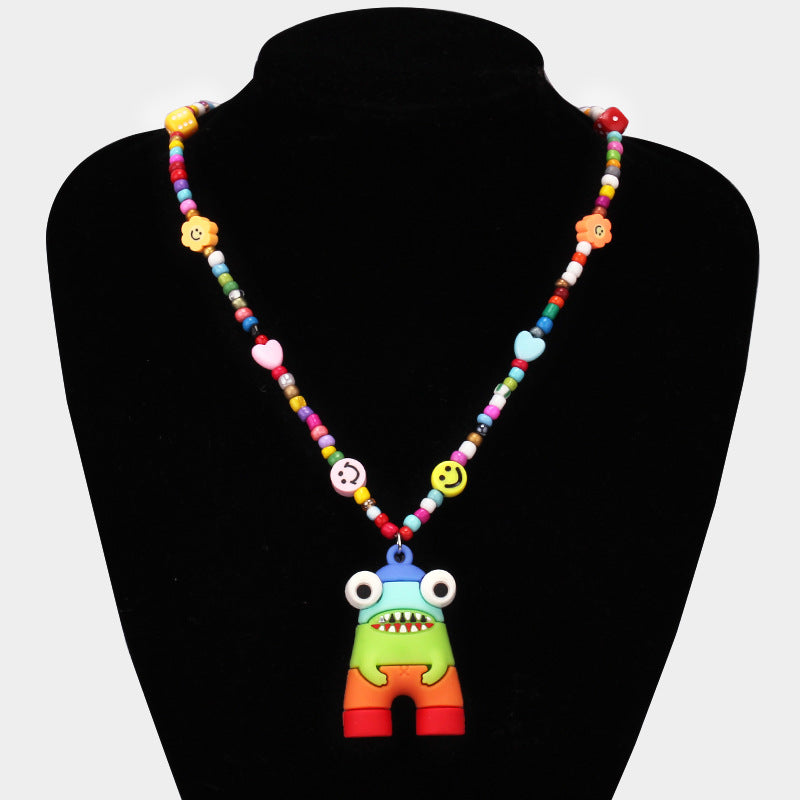 Ins niche design cartoon rainbow monster pendant rice bead necklace hip-hop all-match sweater chain trend style