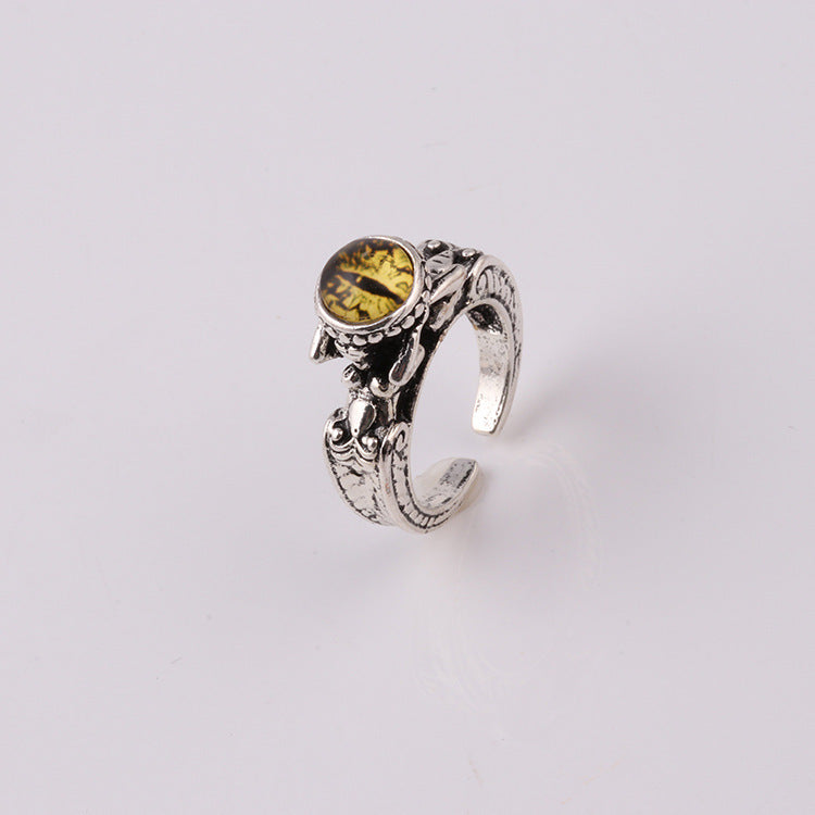 Fashion ring personality male and female models inlaid skull three-dimensional multi-color magic eye personality ring
