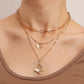 Jewelry colorful light luxury trend multi-layer back-shaped chain micro-inlaid mother-of-pearl butterfly pendant necklace female