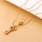 Ins niche light luxury titanium steel gold-plated cross collarbone chain fashion love personality key double layer necklace