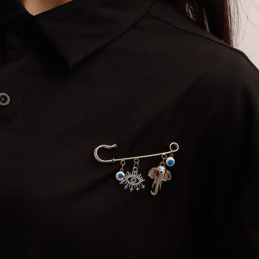 Jewelry ins geometric devil's eye pendant chest pendant pin female trend exaggerated pin accessories