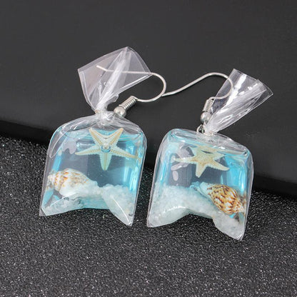 Creative transparent candy ocean conch earrings female personality resin dried flower plant earrings jewelry